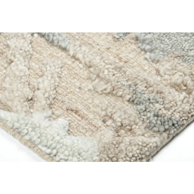 Hand-knotted in fine wool, this 2x3 contemporary rug joins Rug & Kilim’s Modern collection. Defined by a high-low textural...