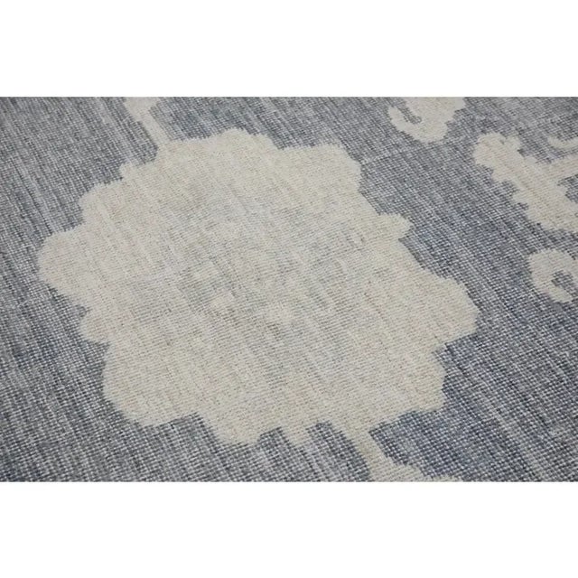 Turkish Oushak Rug Handwoven Wool Blue Floral Design Rug 12'3" X 15' This exquisite Turkish Oushak rug, measuring 12'3" x...