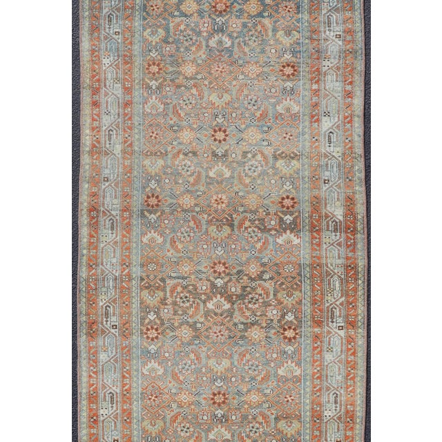 Measures: 3'4 x 17'0 Antique Persian Malayer Runner with Allover Motif's in Soft Blue Field 3'4 x17'0. Keivan Woven Arts/...