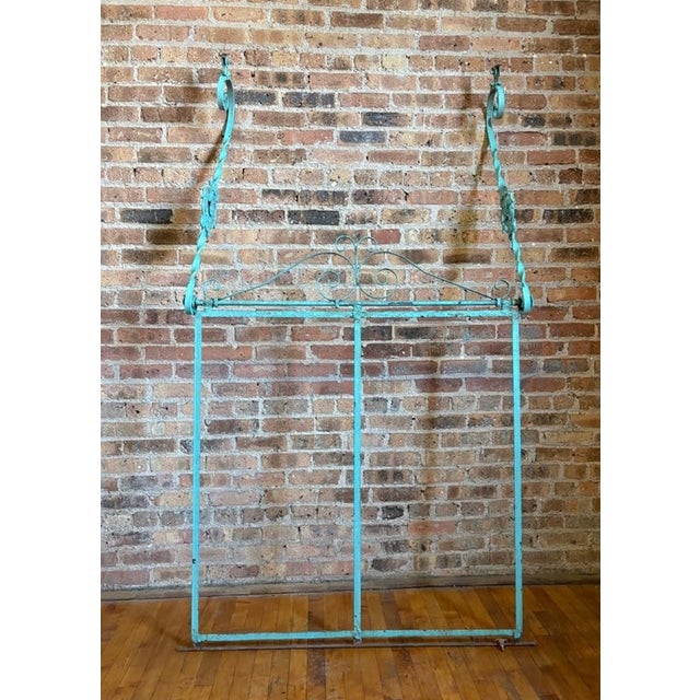 This very cool antique wrought iron hanging sign bracket is begging to be used again! Featuring beautiful, classic...