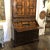 Fantastic Italian walnut secretary with raised carved detail on front doors and drawers. Has a drop down writing surface...