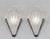SABINO A pair of 1925-1935 French art deco wall sconces by Marius Sabino. Nickel plated solid brass or bronze mounts hold...