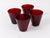 A set of four fine Kartio drinking glasses in rare red glass from the 1950s. Designed by Kaj Franck, executed by...