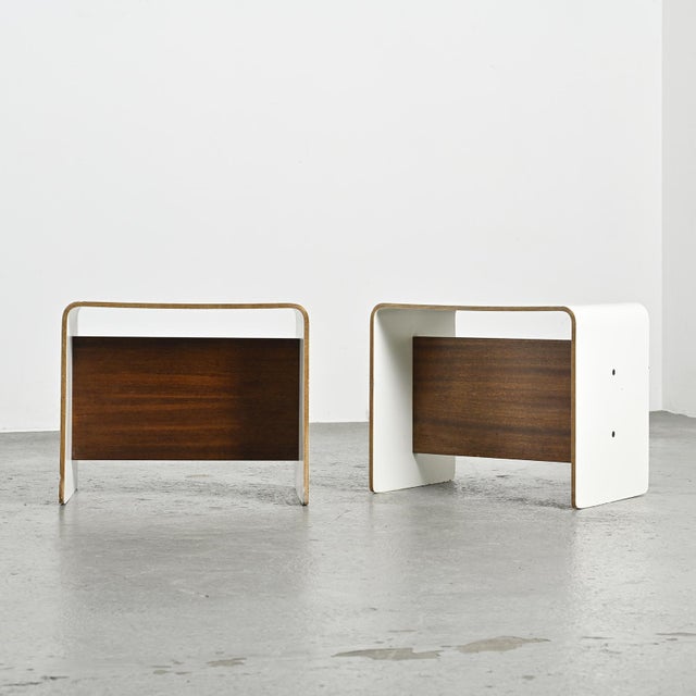 This pair of bedside tables, which can also be used as stools, designed by Pierre Guariche, are characteristic of the...
