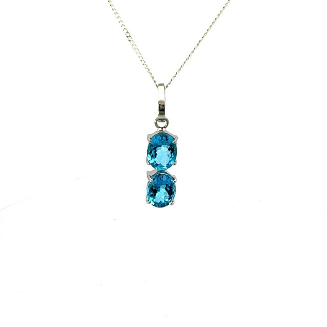 Blue Elegant Blue Topaz 6.48 Carat Oval Cut Two Stone Silver Pendant For Sale - Image 8 of 12