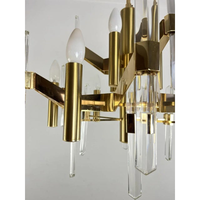 Metal 9-Light Chandelier in Gilded Brass and Crystal attributed to Gaetano Sciolari, 1970s For Sale - Image 7 of 8