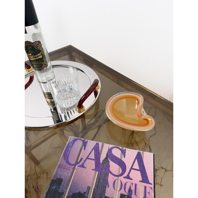 Stunning Murano glass ashtray with an organic form, attributed to Flavio Poli for Seguso and dating from the 1960s–1970s....