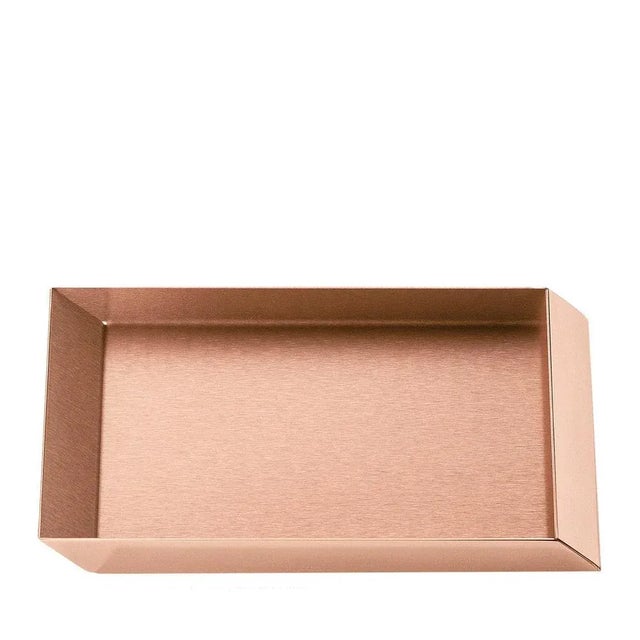 Stunning in its simplicity, this copper tray artfully demonstrates superb craftsmanship and innovative design aesthetic....