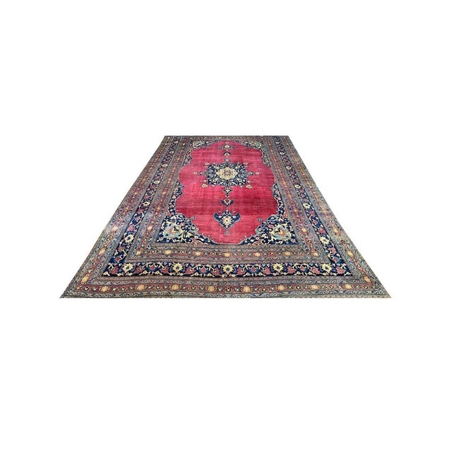 Experience the timeless beauty and artistry of this magnificent 13x20 Antique Persian Khorassan Area Rug. Hand-knotted by...