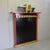 Postmodern Italian Wall Coat Rack in Polychrome Lacquered Wood from Ettore Sottsass, 1988 For Sale - Image 10 of 10