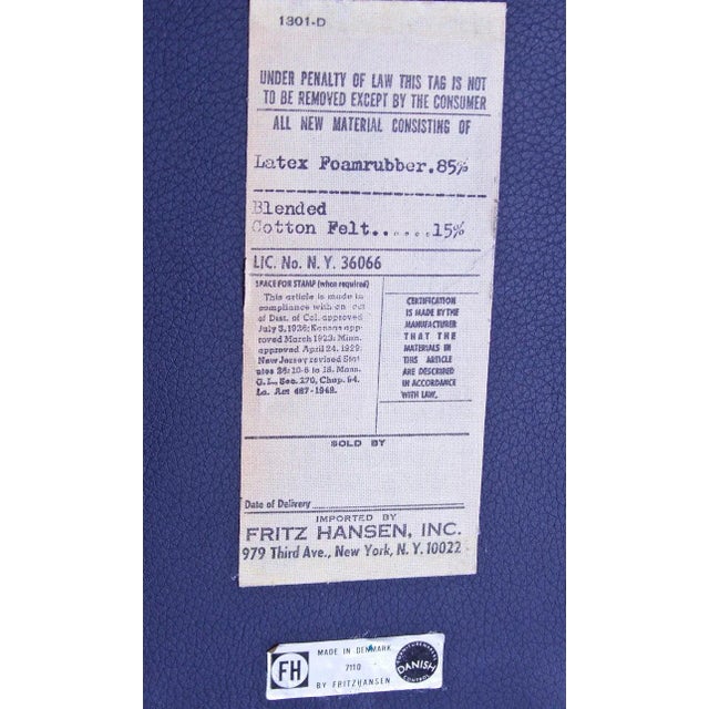 One single Chair still available*—pictured above with additional chair and ottoman. Arne Jacobsen designed the Swan as...