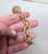 Metal Vintage 1970 Signed Napier Book Piece Goldtone "Wedding Bell" Charm Bracelet For Sale - Image 7 of 11