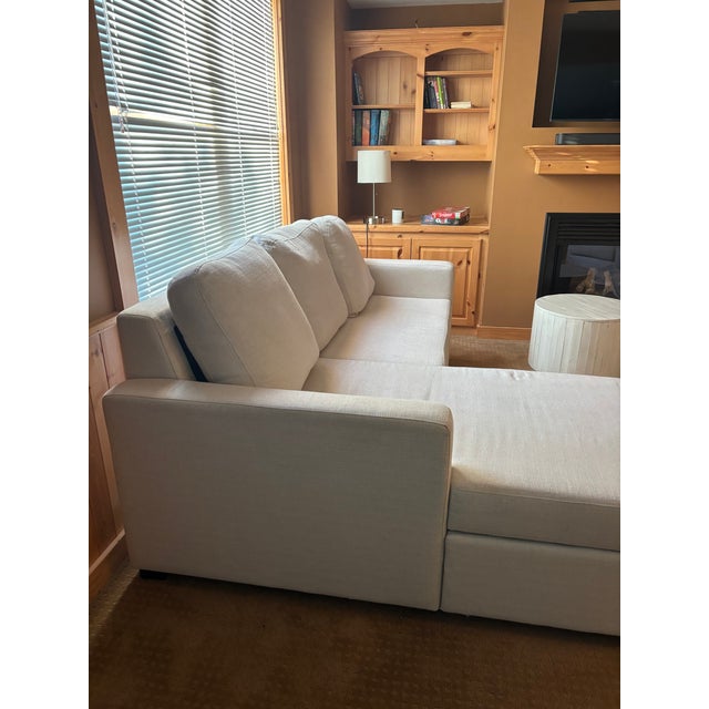 Purchased in 2017 from Pottery Barn, this off-white fabric sofa with chaise lounge and 2 upholstered chairs. They are very...