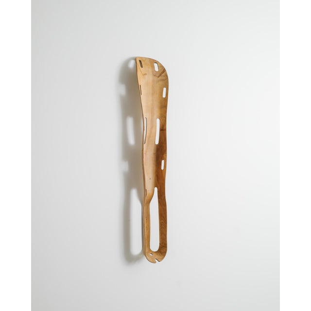 A rare, early and iconic american mid century wooden leg splint in natural molded plywood designed by charles & ray eames...