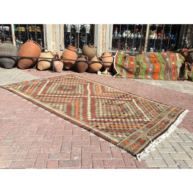 This beautiful, vintage, handwoven Kilim is approximately 60 years old. It is handmade of very fine quality, hand-spun...