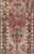 Measures: 4'2 x 14'0. This vintage Oushak runner contains a unique blend of cheerful colors and an intricately beautiful...