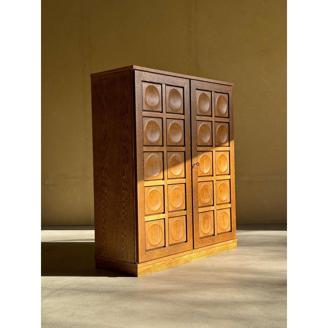 Amazing natural oak brutalist bar cabinet in style of De Coene. Cabinet is perfect refinished condition. Inside lots of...