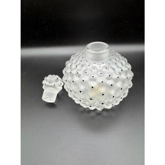 “Iconic Lalique Cactus crystal perfume bottle in exceptional, beautifully preserved condition—an instantly recognizable...