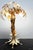 The Hans Kögl Palm Tree table lamp is a unique and luxurious lighting element that brings stylish elegance and exotic...