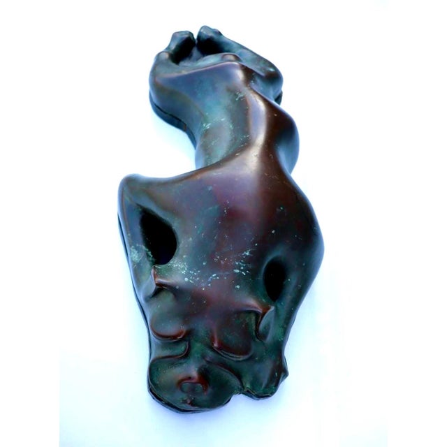 Sculpture Of A Sleeping Dog. A wonderful and realistic cast bronze signed and numbered. With beautiful weathered patina...