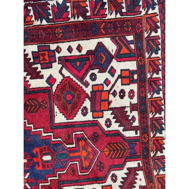 Very beautiful midcentury rug with nice geometric tribal design and beautiful colors, entirely hand knotted with wool...