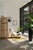 Striking sculptural chaise lounge with matching ottoman, upholstered in a soft cream linen. Defined by its fluid,...
