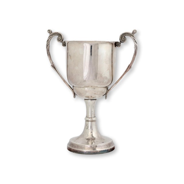 An engaging silverplated presentation trophy awarded during the famed Charles Dickens Festival in Broadstairs, Kent....