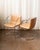 Clean, sculptural, and unmistakably Italian, this set of Saporiti chairs pairs sleek chrome frames with supple saddle...