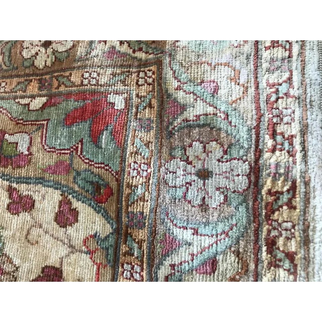 Nice little Turkish rug with beautiful design and light colors, entirely and finely hand knotted with silk velvet on silk...