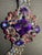 This vintage DeLizza & Elster (Juliana) bracelet features a multi-strand band with a dramatic, cluster-style central...