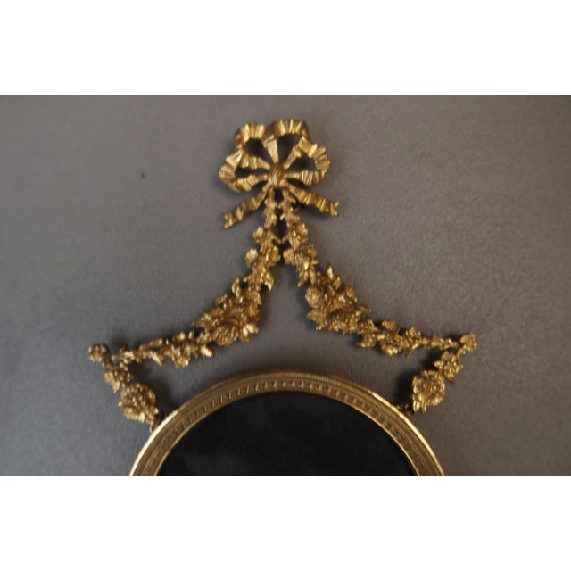Small gilt bronze photo frame from the napoleon iii period. Superb gilding adorns this gilt bronze frame. It can hold a...