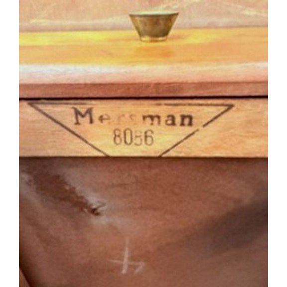Vintage matched pair of Mersman Model 8066 Mid-Century Modern end tables, featuring a handsome warm wood finish and...