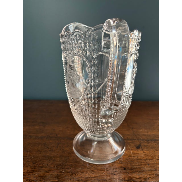 This item is a classic example of Early American Pattern Glass (EAPG), specifically the 'Valentine' pattern, also known as...