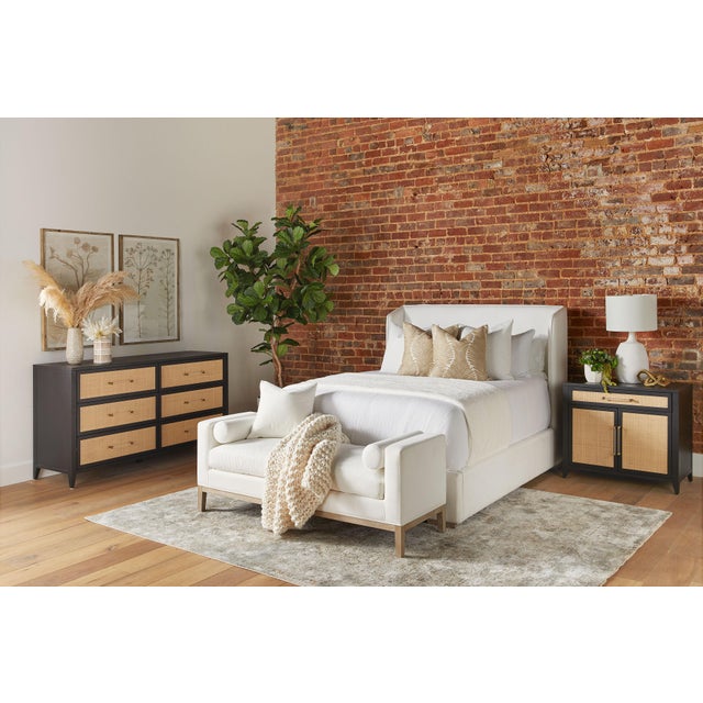 This transitional media chest nicely blends design styles taken from tropical, traditional, and modern looks. The front...