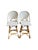A beautiful pair of Serena & Lily swivel bar chairs featuring a classic coastal design with natural rattan frames and...
