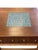 Beautiful mid-century coffee table by Lane Furniture, featuring a center drawer with brass drawer pulls, tapered legs with...
