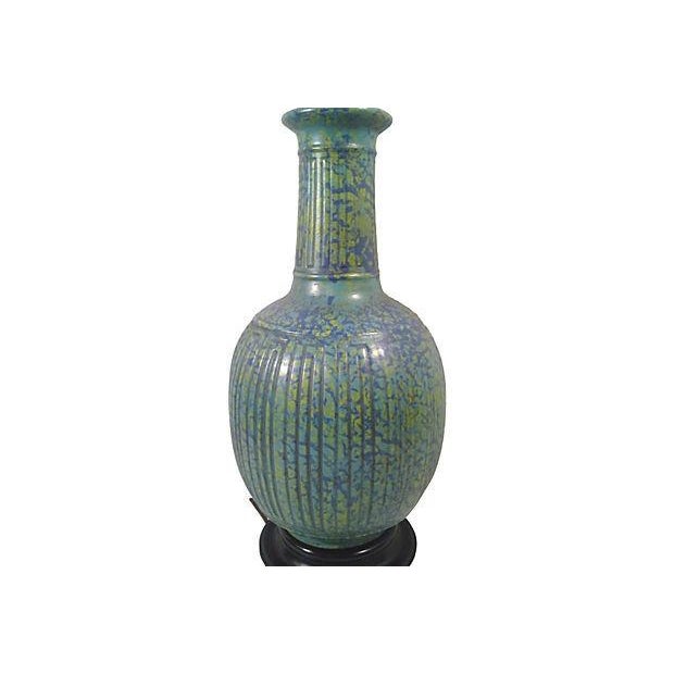 Marbro turquoise Asian ceramic lamp in the style of James Mont with turquoise and green mottled glaze and a geometric...