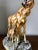 Vintage large ceramic mother and baby giraffe figure, marked "Made in Italy".