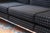 A pair of Jack Cartwright LC2 style sofas. This pair of super chic, modern 1980s sofas are made by Jack Cartwright and are...