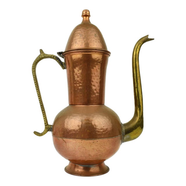Mid 20th Century Hand Hammered Middle Eastern Copper Ewer Dallah Coffee Pot With Brass Handle and Spout For Sale