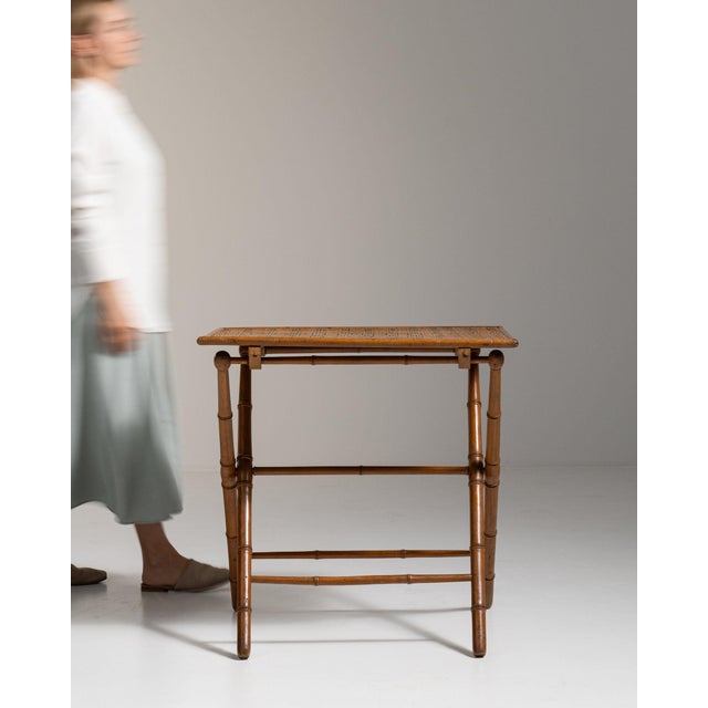 Faux-bamboo side table in Warm Honey Bamboo. Finished in warm honey bamboo, this faux-bamboo side table is distinguished...