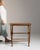 Faux-bamboo side table in Warm Honey Bamboo. Finished in warm honey bamboo, this faux-bamboo side table is distinguished...