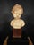 XIX Century child wax bust. Curious bust in wax representing a child of the xix century on wooden base total measurements:...
