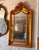 Make a statement with this magnificent French Rococo-inspired mirror, featuring an elaborate frame richly finished with...