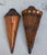 Striking vintage pair of sculptural rattan and bamboo wall pockets with a strong, architectural presence. The two pieces...