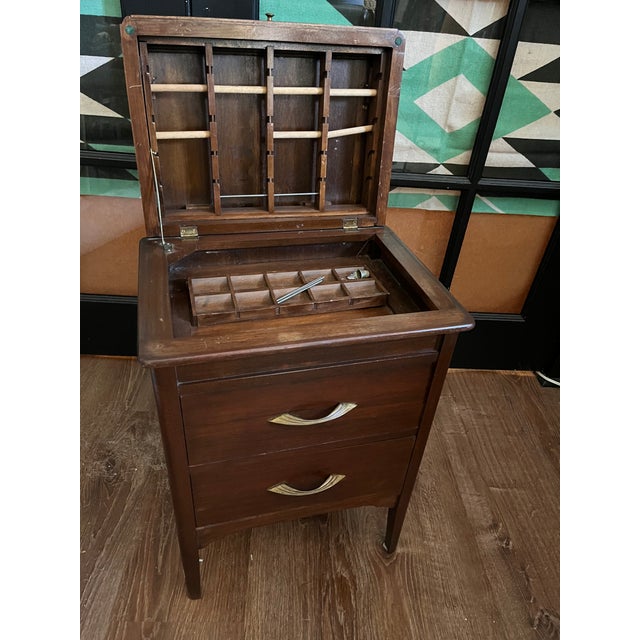 Precious deco-style antique sewing chest w/ Spool storage and 2 drawers. Stylish bull-nose flip top with decorative lift...
