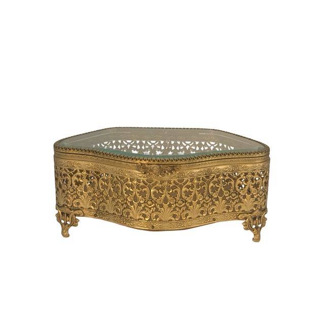Exceptional large antique gilt-metal jewelry or dresser casket, dating to the early 20th century, circa 1900–1920. This...