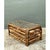 This vintage bamboo coffee table showcases an intricate blend of natural material craftsmanship and architectural detail,...