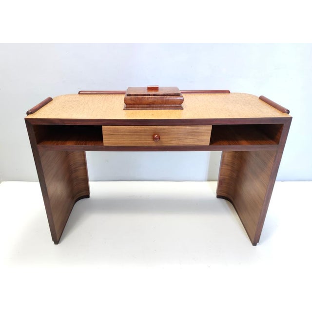 Made in Italy, 1940s. It's made in walnut, birch and beech. This desk was probably realized in Brianza, due to its amazing...