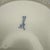 This plate is distinguished by its intricately crafted openwork rim and the timeless "onion pattern" decoration in...